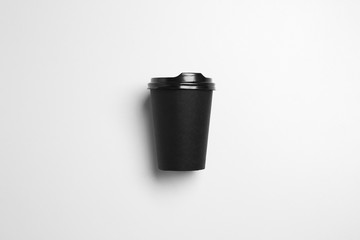 Takeaway cup for drink on light background