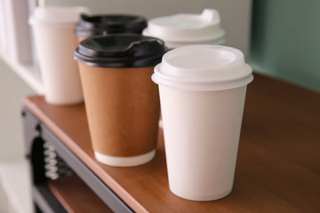 Takeaway cups for drink on table