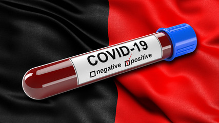 Obraz premium Italian state flag of Aosta Valley waving in the wind with a positive Covid-19 blood test tube. 3D illustration concept for blood testing for diagnosis of the new Corona virus.