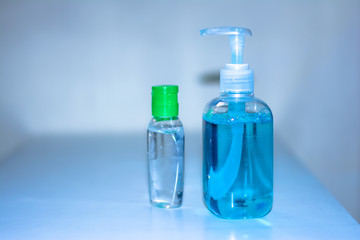 Blue bottle of hand sanitizer and anti-bacterial hand gel, Hand washing, Hand hygiene for Corona virus prevention 
