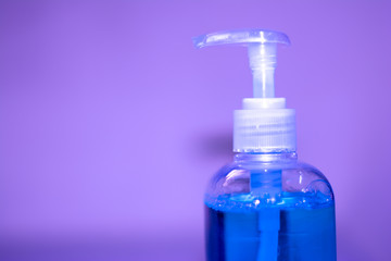 Blue bottle of hand sanitizer and anti-bacterial hand gel, Hand washing, Hand hygiene for Corona virus prevention 
