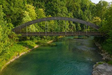 Fototapeta premium Aerial view of the Serio river and old bridge, Val Seriana Bergamo.