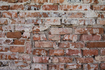 A texture of an Old ruinous brick wall 