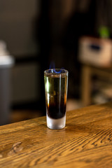 Making an alcoholic cocktail in a bar.