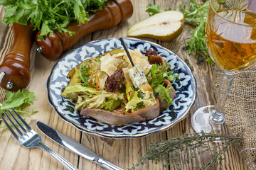 Salad from cheese, cucumber, red onions and lettuce leaves. healthy summer vitamin menu. vegan vegetable food. vegetarian dinner table. top view. flat lay