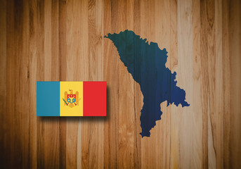 Map and flag of Moldova on wooden background, 3D illustration