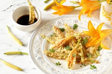 daylily buds fried in batter. edible flowers.