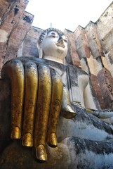 Phra Achana is the name of ancient Buddha image in the mondop of the Si Chum temple. Located in the North zone of Sukhothai Historical Park, THAILAND.
