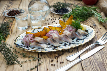 Herring salad with onion and potatoes