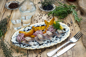 Herring salad with onion and potatoes