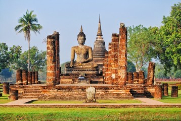 Fototapeta premium Mahathat Temple in the Sukhothai Historical Park, One of Thailand’s most impressive World Heritage sites. It is near the city of Sukhothai, THAILAND.