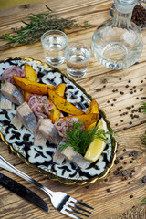 Herring salad with onion and potatoes