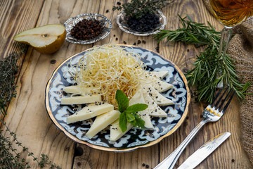 Top view delicious variety of cheese on the table 