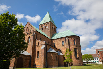Fototapeta premium Sct bendts church i denmark woth blue sky and clouds