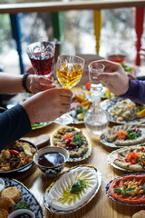Table of enjoying food with family and friends top view