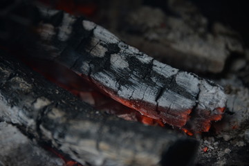 the fire burns on wood burning them at a very high temperature