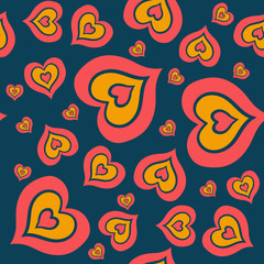 The seamless pattern consists of many multi-colored hearts embedded in each other on a dark blue background