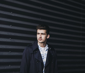 Fototapeta premium Portrait of a young handsome man wearing jacket