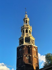 Fototapeta na wymiar Old clock tower in Amsterdam Netherlands 