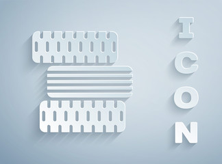 Paper cut Car tire wheel icon isolated on grey background. Paper art style. Vector Illustration