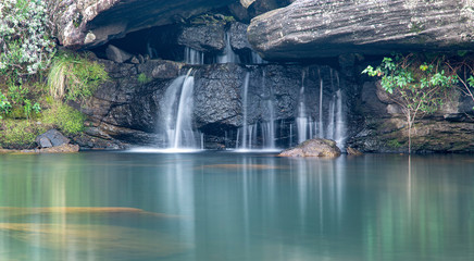 Secluded Waterfall in Drakensberg hiking trail morning shot