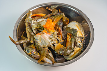 Bowl of raw crab with full of crab eggs 