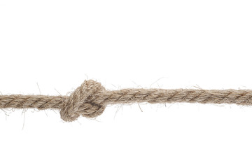 A rope twisted into a knot. Full depth of field.