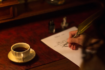 beautiful elegant bride in white robe write a letter for her groom