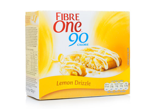 LONDON, UK - NOVEMBER 10, 2019: Box of Fibre One 90 Calorie Lemon Drizzle snack bars on white background.
