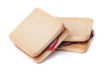 Self made square cookies with jam isolated