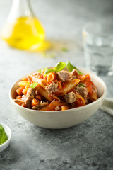 Pasta with chicken and tomato sauce