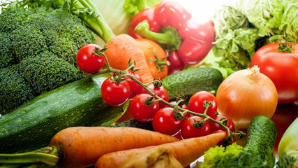 Clsoeup photo of natural fresh vegetables from home garden on kitchen table