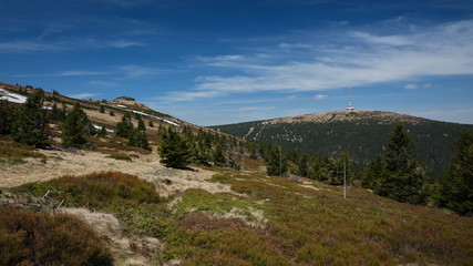 View of Petrovy Kameny and Praded transmitter tower in Jeseniky mountain ridge. Czech Republic