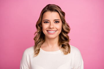 Close-up portrait of her she nice-looking attractive lovable lovely cute shine cheerful cheery wavy-haired girl wearing comfortable pullover isolated over pink pastel color background