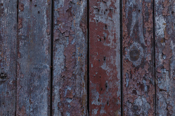 Brown wooden boards or fence texture background or backdrop with old paint