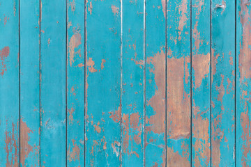Blue wooden boards or fence texture background or backdrop with old paint