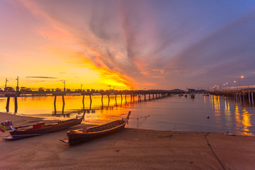 Obraz premium sunrise at Chalong pier. Chalong bay is the most important marina of Phuket there have 2 piers and customs at pier..