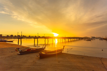 Obraz premium sunrise at Chalong pier. Chalong bay is the most important marina of Phuket there have 2 piers and customs at pier..