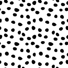 Background polka dot. Seamless pattern. Random dots, circles, animal skin. Design for fabric, wallpaper. Irregular random abstract vector texture. Repeating graphic backdrop