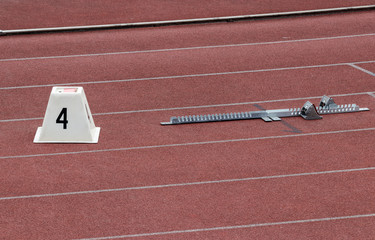 starting block in a red running track