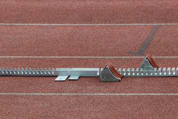 starting block in a red running track