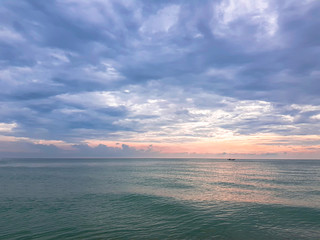 Orange light sea and clouds