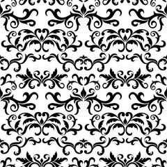 Seamless pattern with ornate Damask ornament on a white background. Design of curls and plant elements. Ideal for textile print and wallpapers.