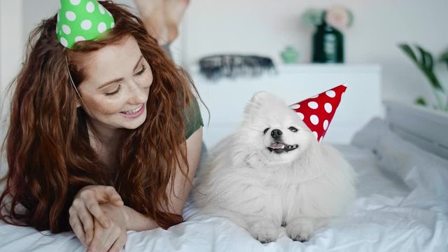 Video of birthday celebration of woman and her dog