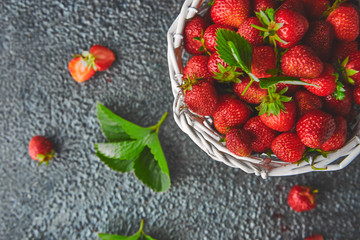 Strawberries in white basket. Fresh strawberries. Beautiful strawberries.