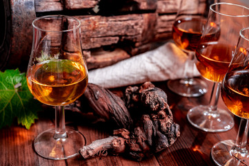Tasting of aged french cognac brandy in old cellars of cognac-producing regions Champagne or Bois,...