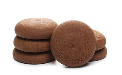 Round chocolate cakes, pastries with creamy filling isolated on white background