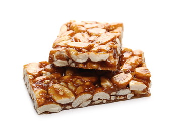 Granola muesli protein, energy bar with honey and peanuts isolated on white background