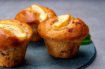 Fresh baked muffins with apple and cinnamon close up