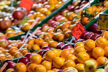 Heap of fresh fruits at a farmer's market stall. Selective focus